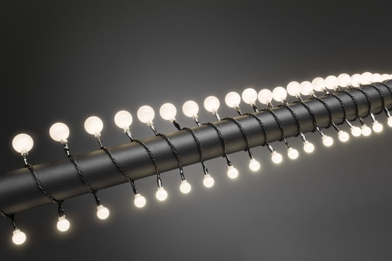 Konstsmide 3680-107 - LED Globelichterkette, kleine & große runde Dioden, 80 warm weiße Dioden, 24V Außentrafo, schwarzes Kabel