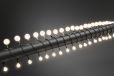 Konstsmide 3680-107 - LED Globelichterkette, kleine & große runde Dioden, 80 warm weiße Dioden, 24V Außentrafo, schwarzes Kabel